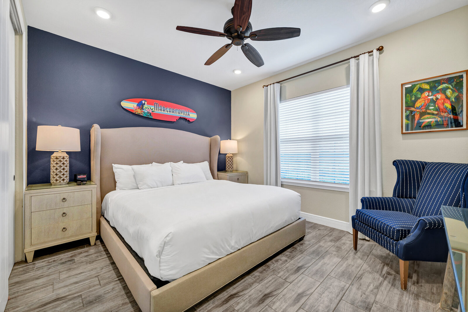 King bedroom with navy accent wall