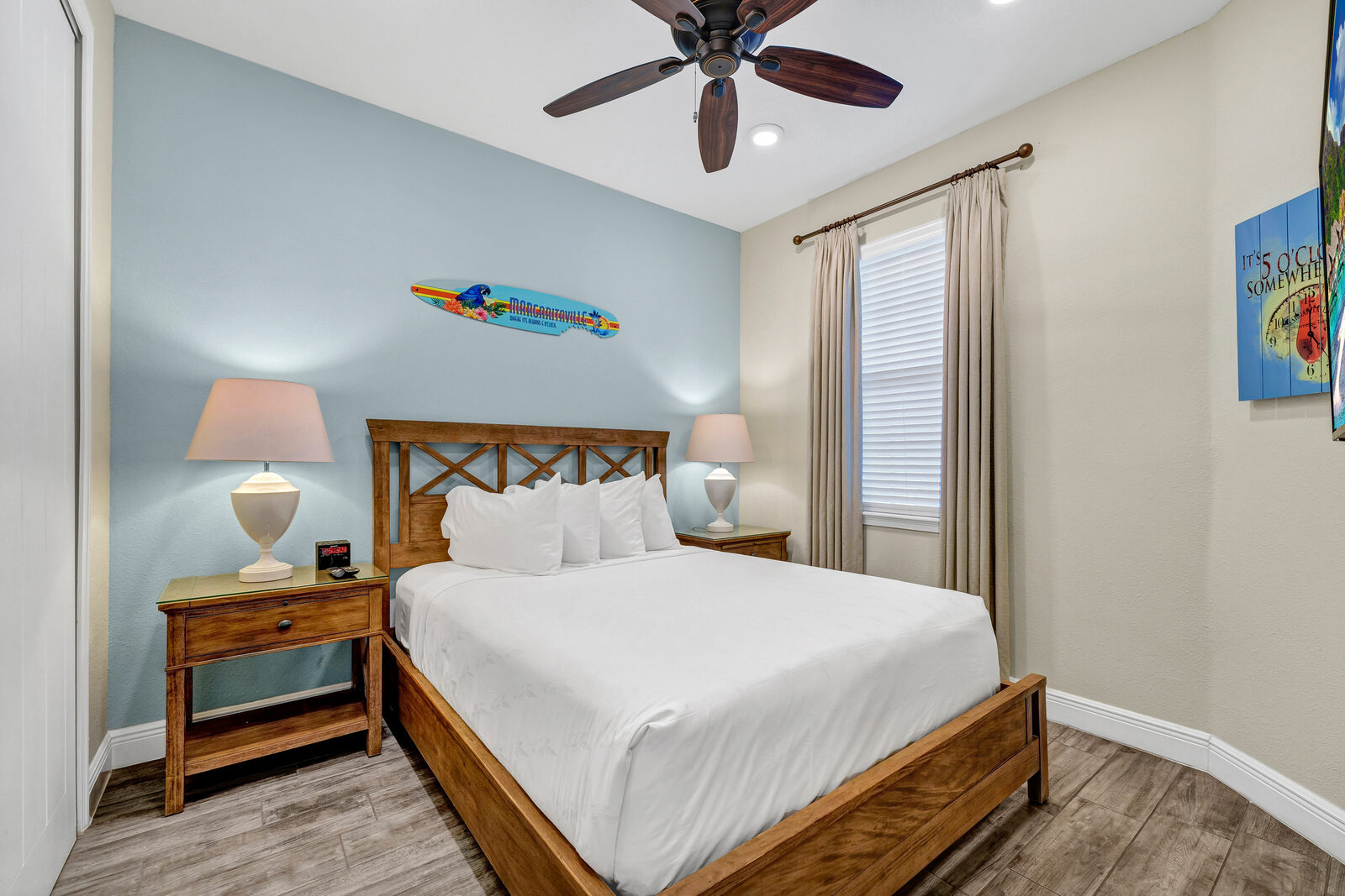Queen bedroom with surfboard art