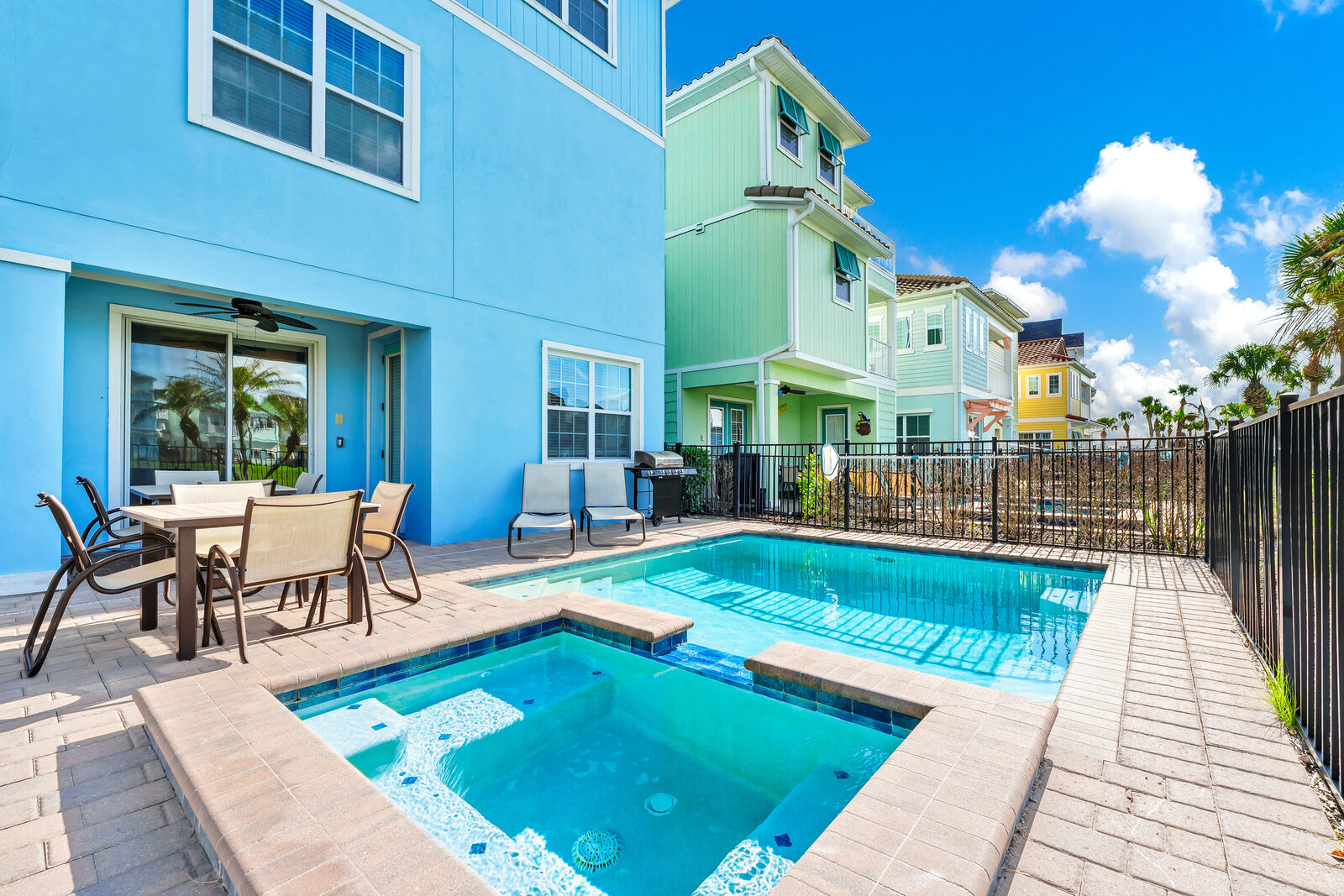 Private pool with attached spa and patio dining set