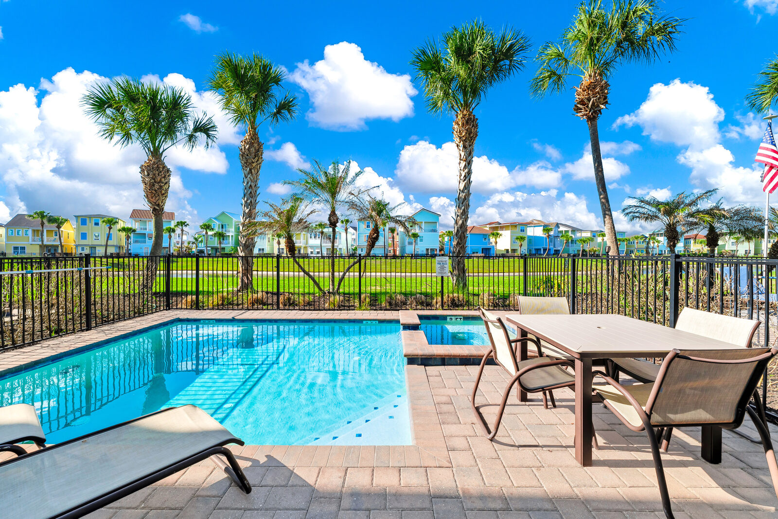 Pool and patio looking out to the lake